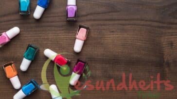 nail polish bottles on brown wooden table