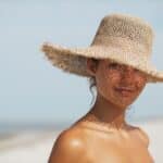 Beach Woman in Sun Hat on Vacation